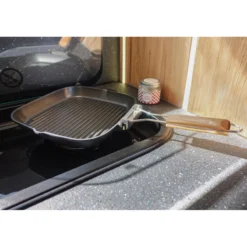 Grill avec poignée pliante