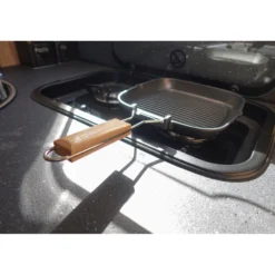 Grill avec poignée pliante
