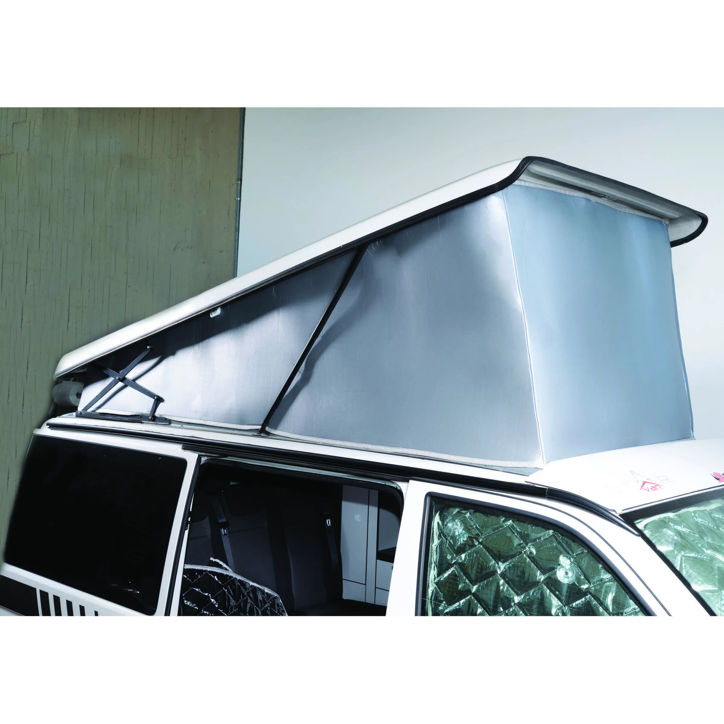 Protection isotherme pour toit relevable